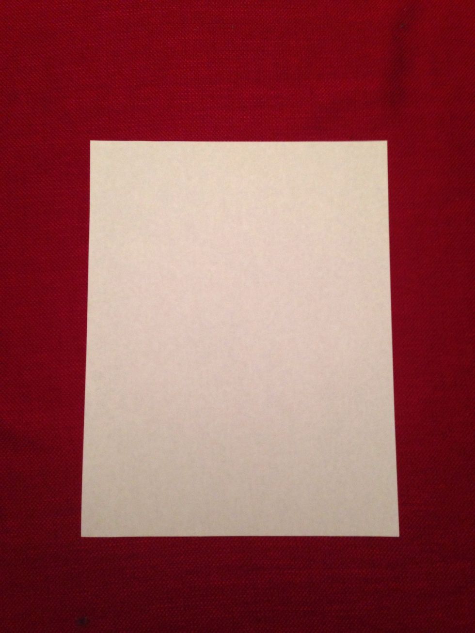 Place your piece of paper on your table or desk.