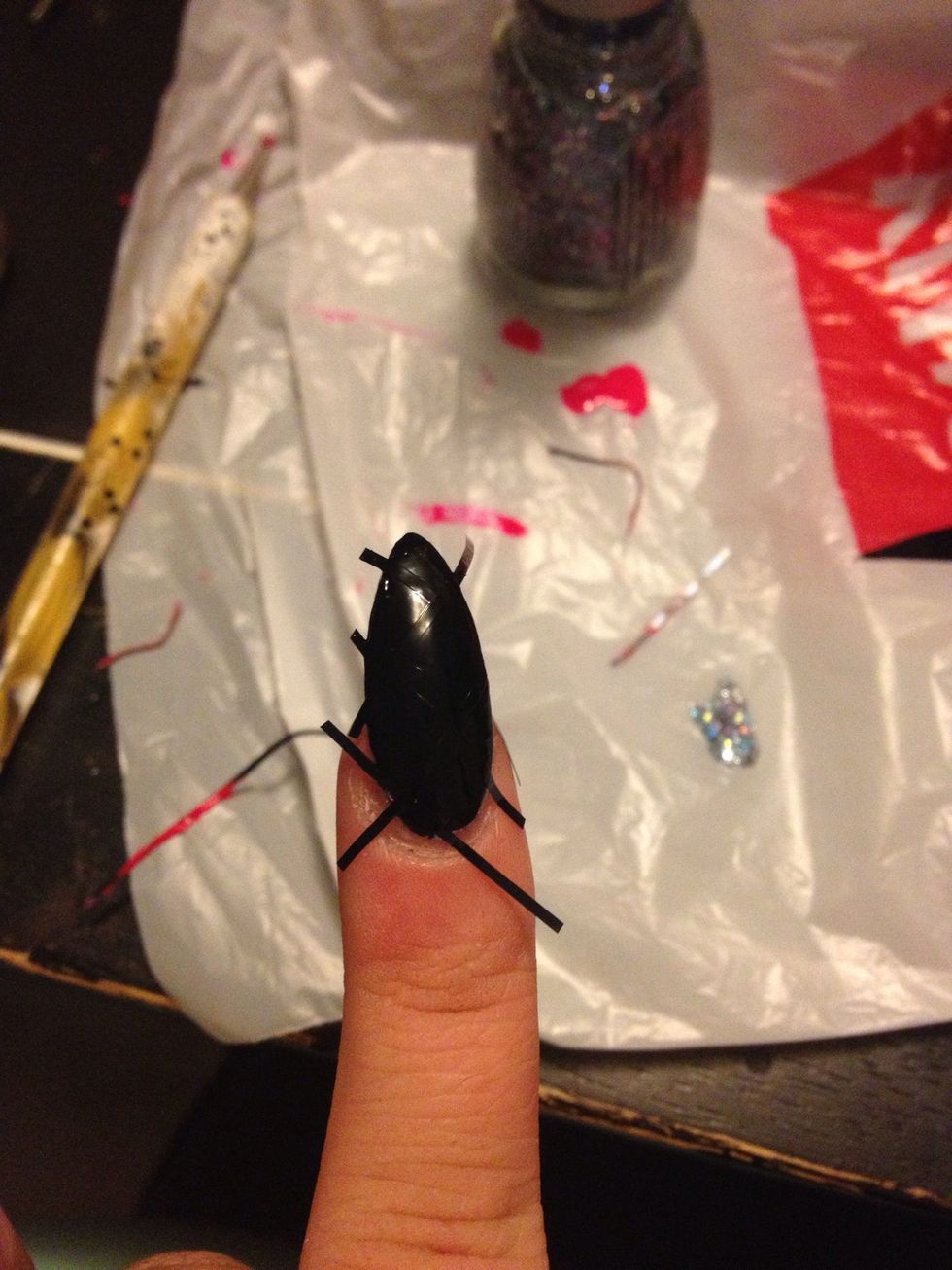 Place your polish over the tape and wait about 5 minutes to dry.