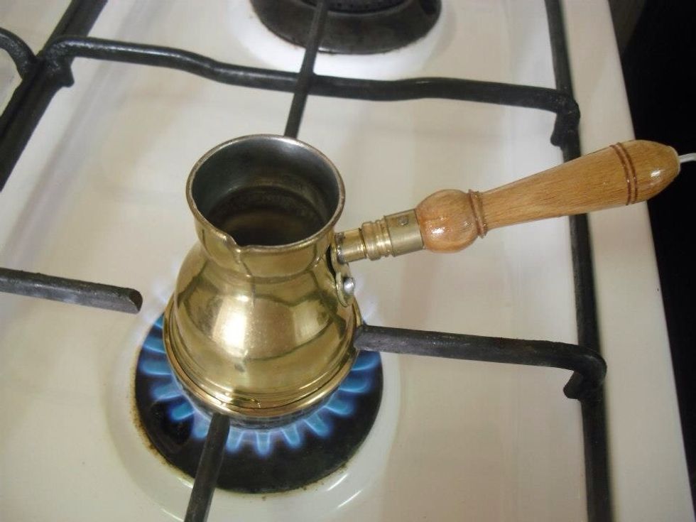 Place your pot of water on the stove and turn the heat to medium hight ( just until the water heats up ).