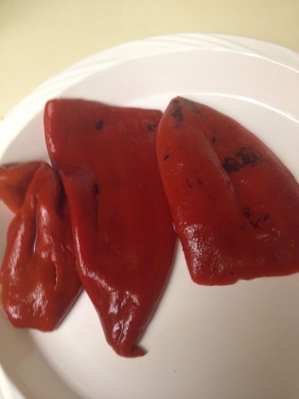 Place your red peppers on a cutting board.