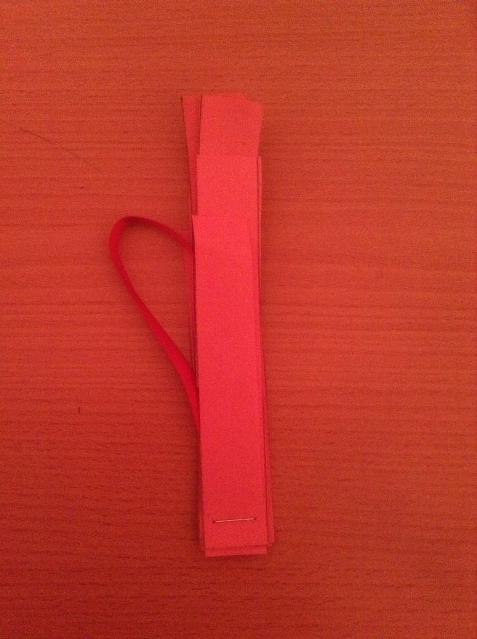 Place your ribbon on top of the pile of strips going smallest to biggest then put the other pile on top and staple. *Click on the image to see the staple!*