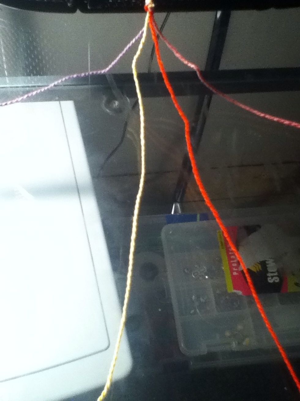 Place your string in the order you want it. I chose purple (1), yellow (2), red (3), and pink (4).