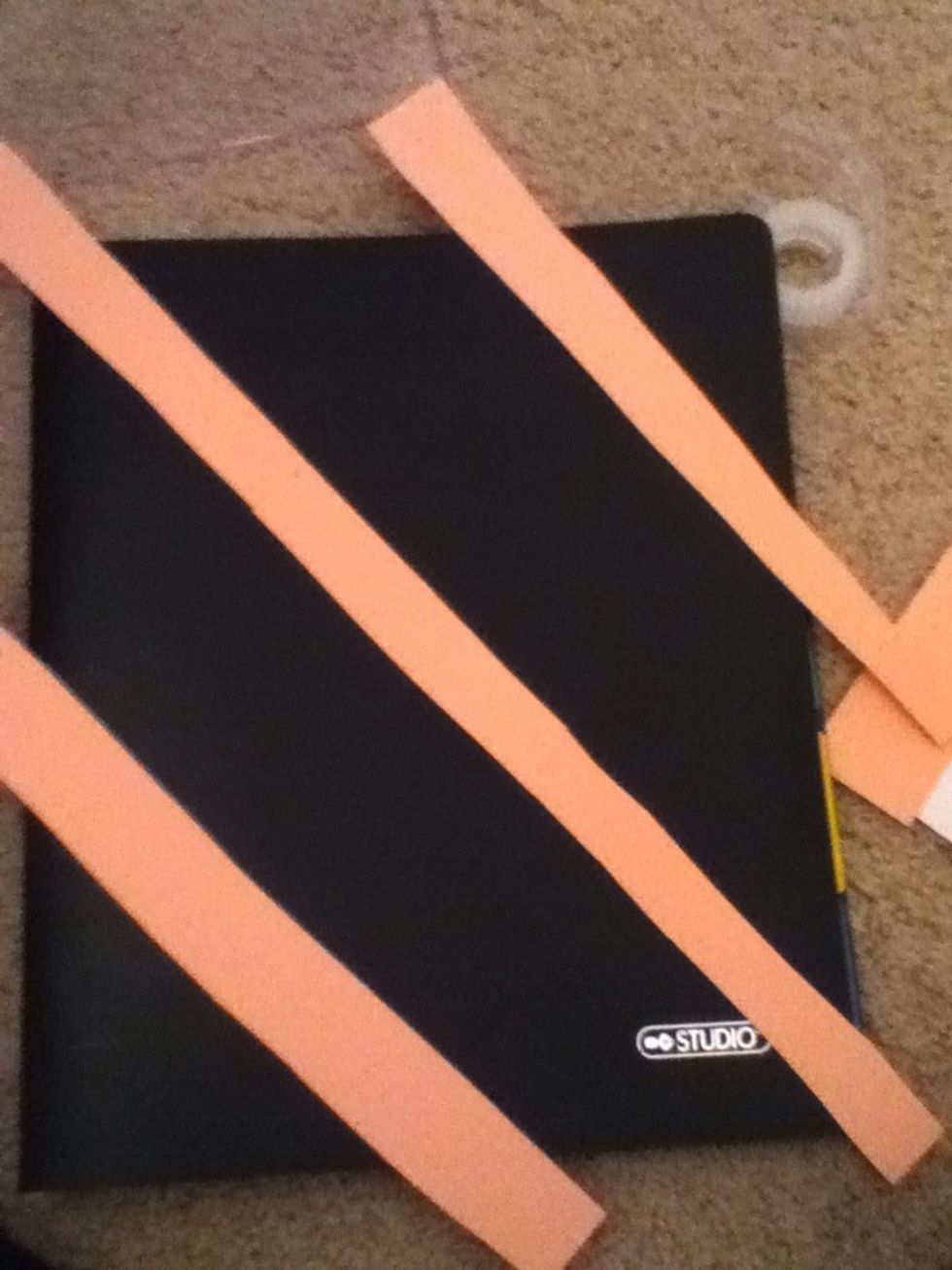 Place your strips on your binder! Add two for the middle strip so it covers it end to end ^-^