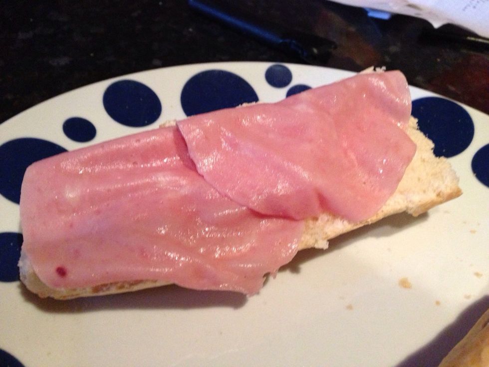 Place your turkey slices on the bottom loaf.