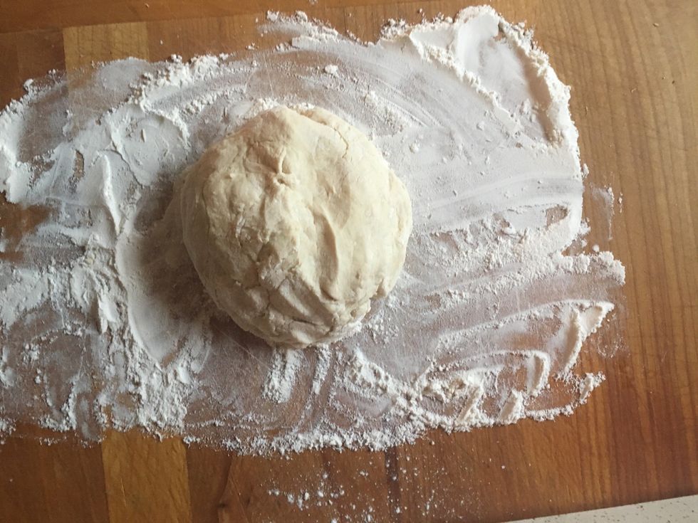 Place your un-kneaded dough on the surface