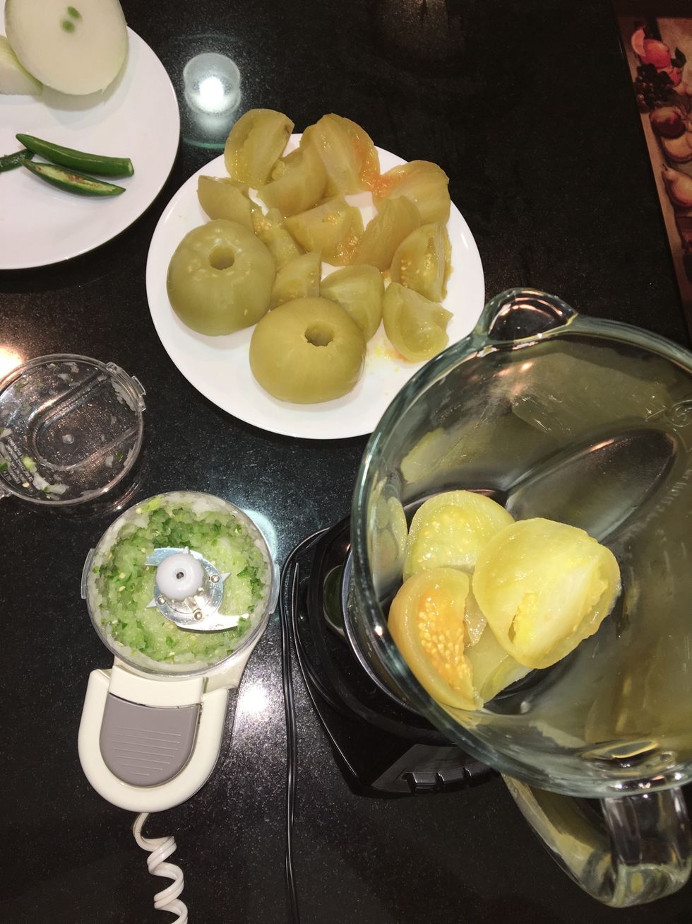 Placed onion, peppers, and tomatoes into food processor and chop.