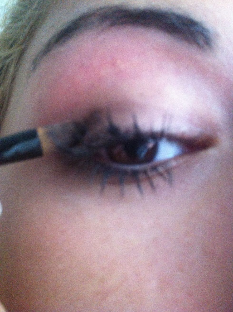 Placing a this line in the corner and crease and blending it out getting softer the closer the the tear tuct of the eye creating an ombre look