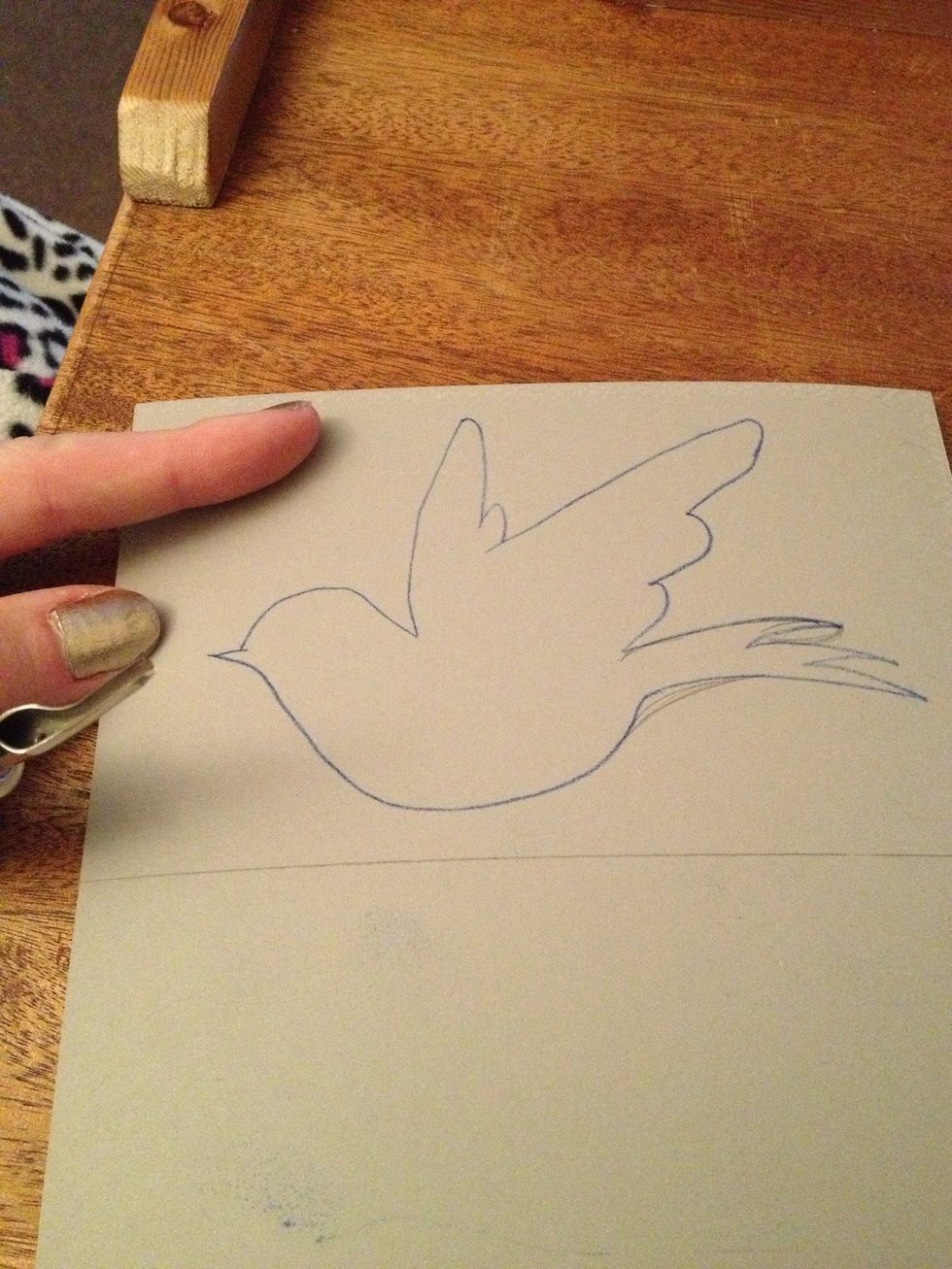 Plan which areas will be coloured (inked) and which will remain white (un-inked). For this one, I think the dove shape will be cut out (white).