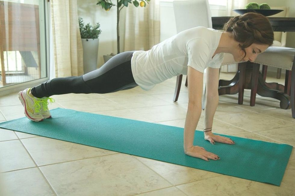 Plank Dips Part I: Continue in plank position and slowly dip the left, then right hip to the ground.
