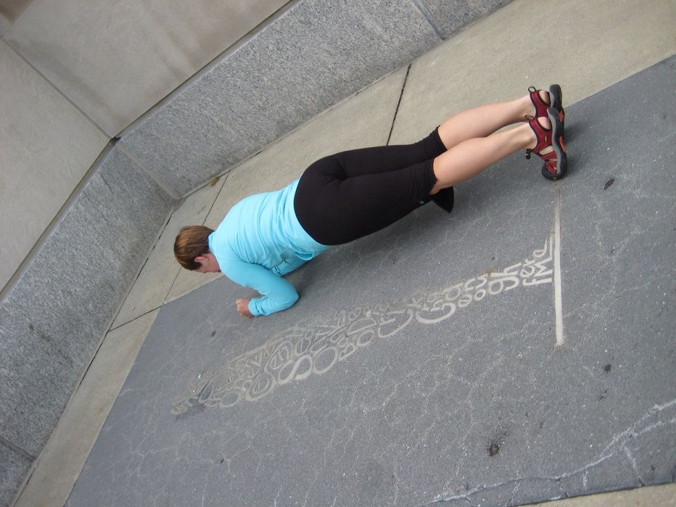 Plank-lie face down resting on the forearms, palms in the floor. Push off the floor, raising up onto toes and resting on the elbow.