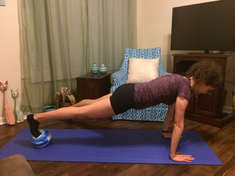 Plank Toe Taps: Step your other leg out to the side and tap the ground.