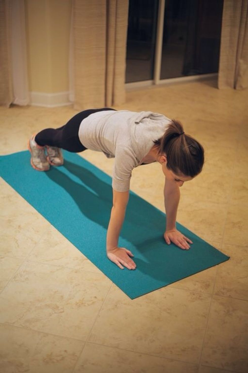Plank Tucks: Start in plank position with bum tucked and shoulders down.