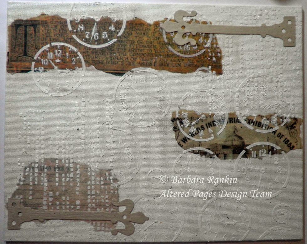 Planning the placement of your focal pieces is important, because once you glue pieces down, you are pretty much committed to that placement. Use matte medium to adhere die cut hinges and bird.