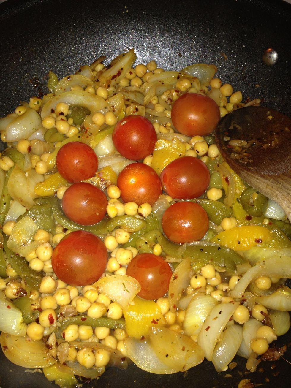 plant cherry tomatoes in middle of wok, ensure they touch the bottom. low heat still.