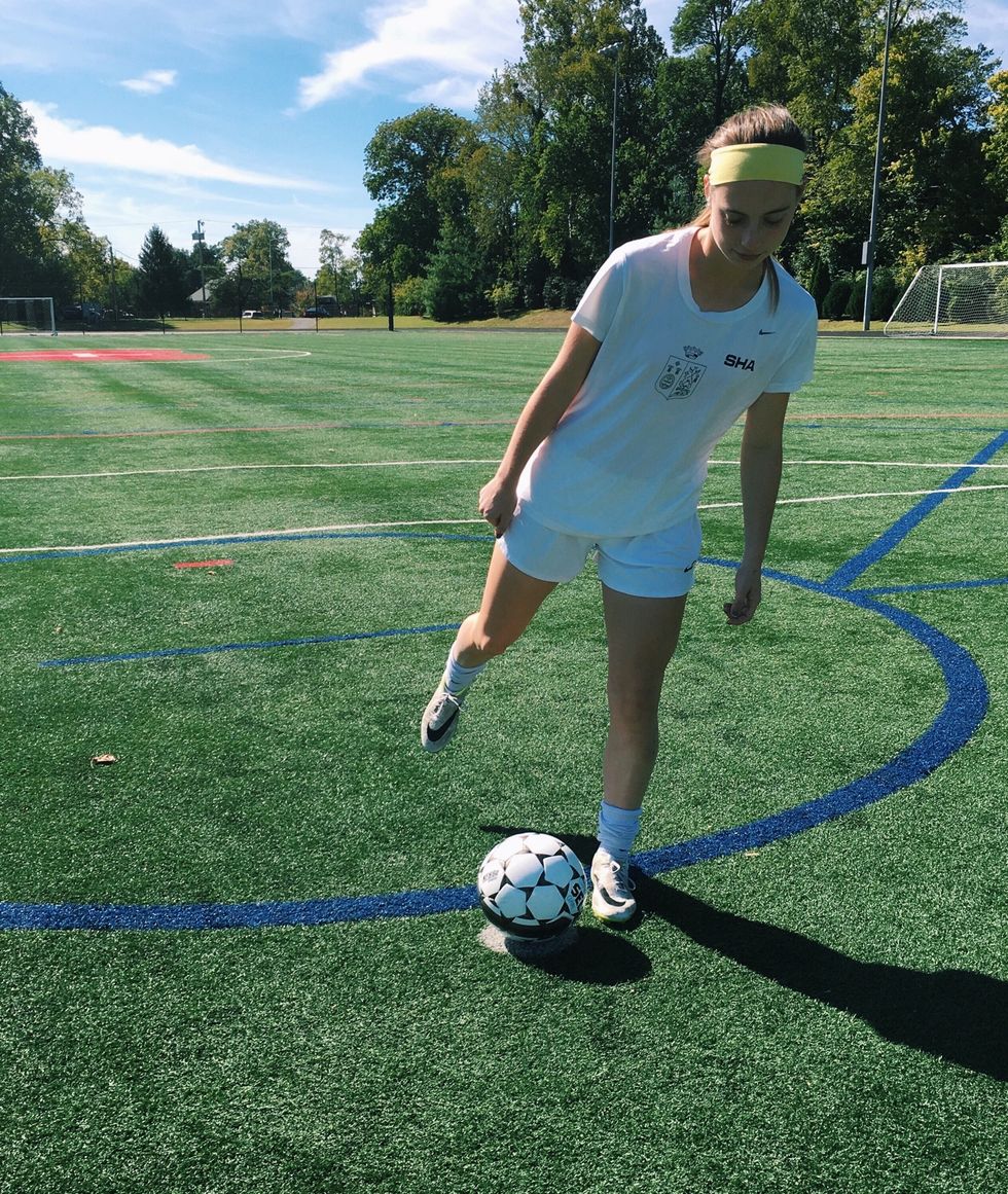 Plant your non-shooting foot beside the ball and in the direction you will be kicking.