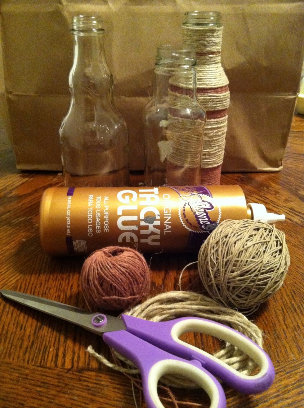 Plastic bottles can work too but I prefer the weight of glass because I'm going to put flowers in them. For a colorful, kid friendly variation use bright braiding cord.