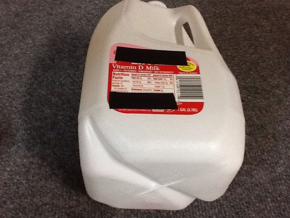 Plastic milk jugs, rinsed out.