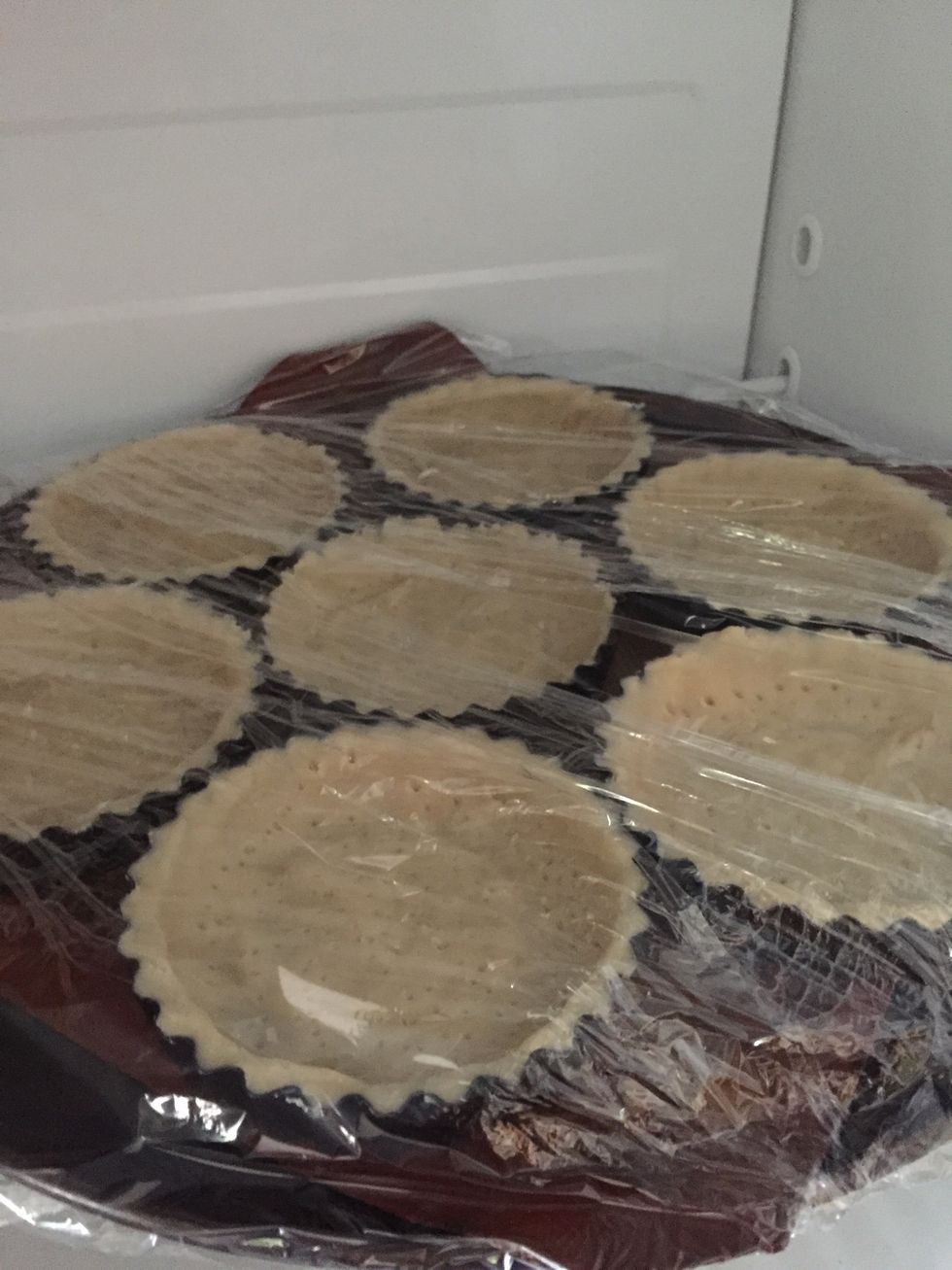 Plastic wrap them loosely and place in freezer for about 30 minutes. This helps keep their shape as you bake them