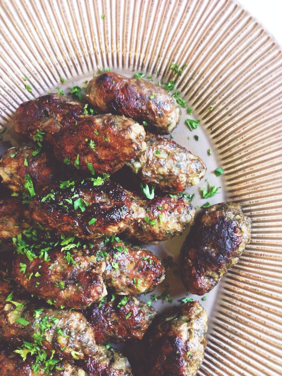 Plate on serving tray and garnish with a sprinkle of chopped parsley. It tastes great next to some hummus - Sahtein! (To your health!)