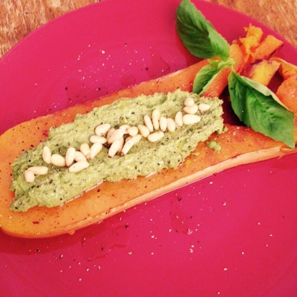 Plate the steak in the middle, adding the avocado pesto on top and garnishing with some pine nuts, basil leaves and some freshly cracked pepper. Enjoy!