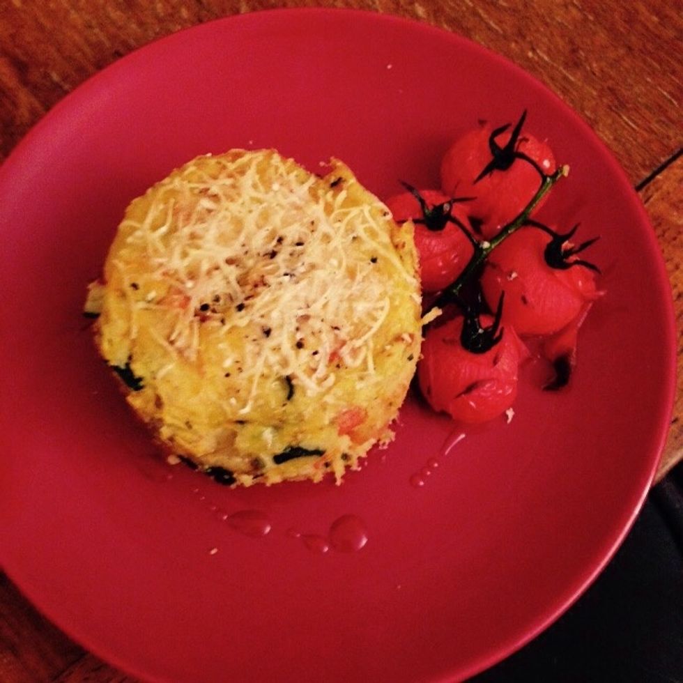 Plate with the grape vine tomatoes, drizzle with olive oil