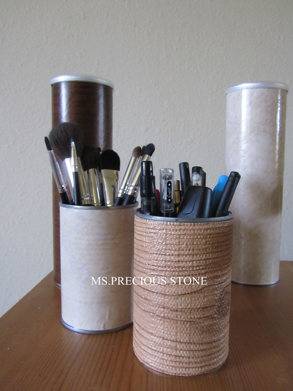 Play around with different liners and sizes of cans for different purposes. I use Pringles cans to store spaghetti and nuts in the kitchen. They also look nice.