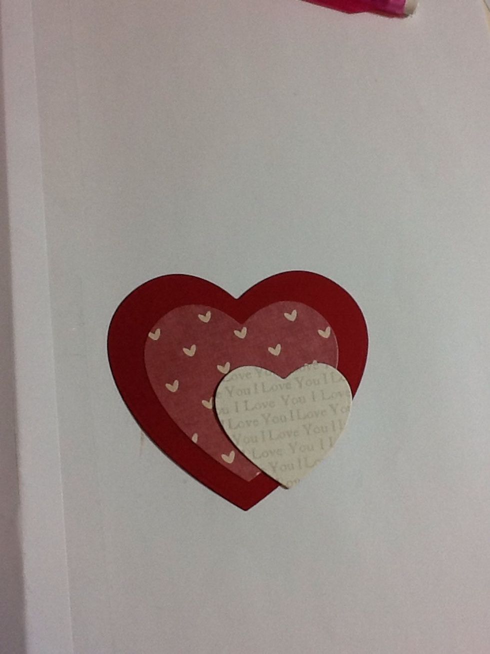 Play around with the layout of the 3 hearts on each other, line them all up or have one or both smaller hearts a little jaunty!