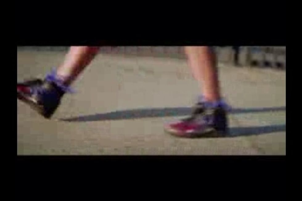Play the video. Then press the Lock screen at the top of the phone. The audio will stop and the screen will turn off....