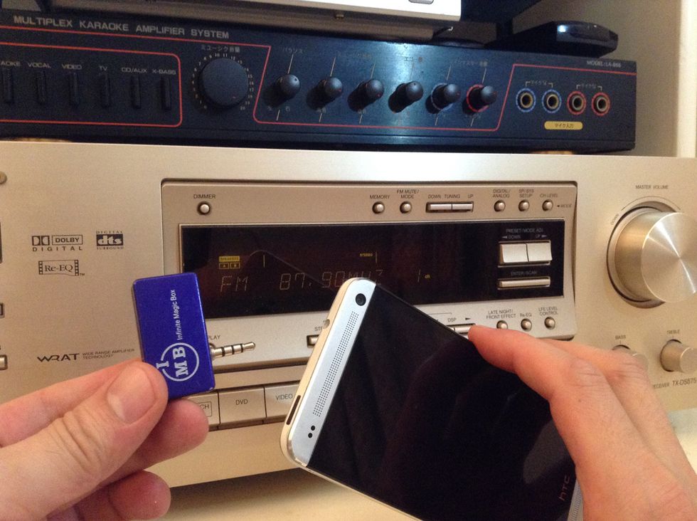 Plug in the IMB aFM Music Transmitter to the droid phone