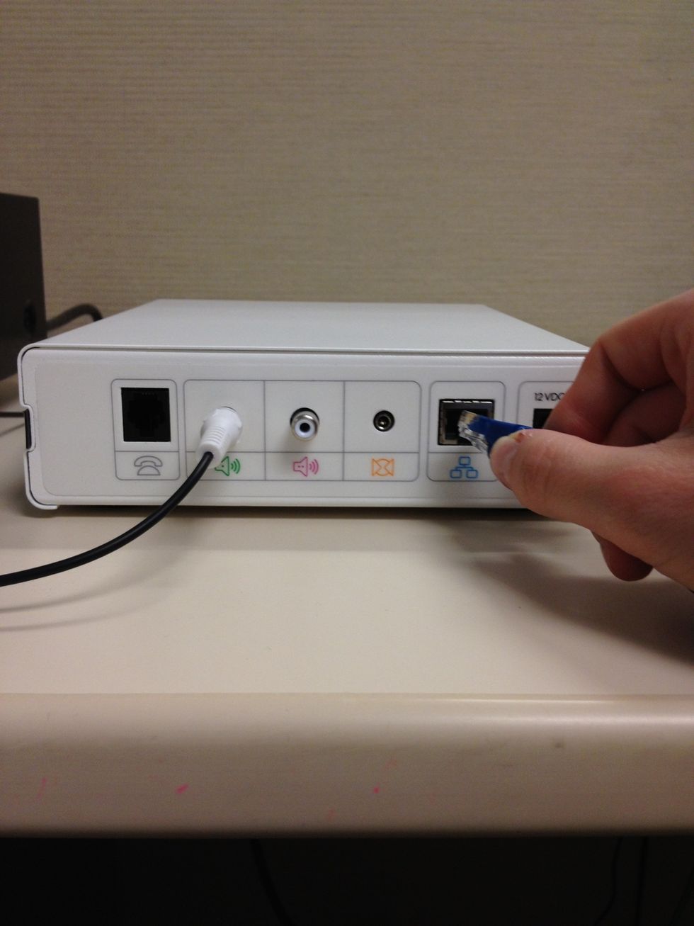 Plug in your Network (shown) or Modem (not shown) cable to the MBOX. Plug the other end into your Network Router or Hub. For Modem plug the other end in using the splitter to the wall (e.g. Fax Line).