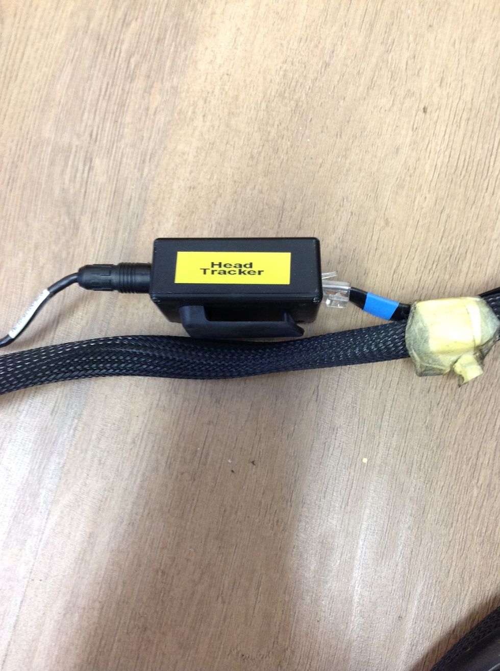 Plug the belt pack into the cable mounted in the HMD umbilical.