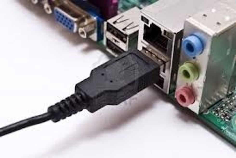 plug the cord into the usb socket on the computer