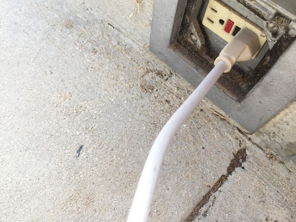 Plug the power strip in the outlet on the stage. Make sure you see a red light on the power strip :)!