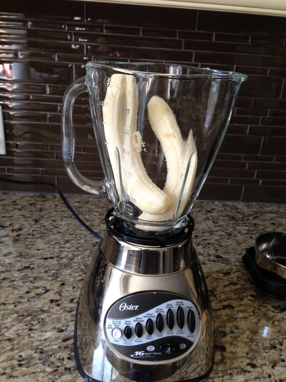 Plug your blender and put two brownish bananas inside !