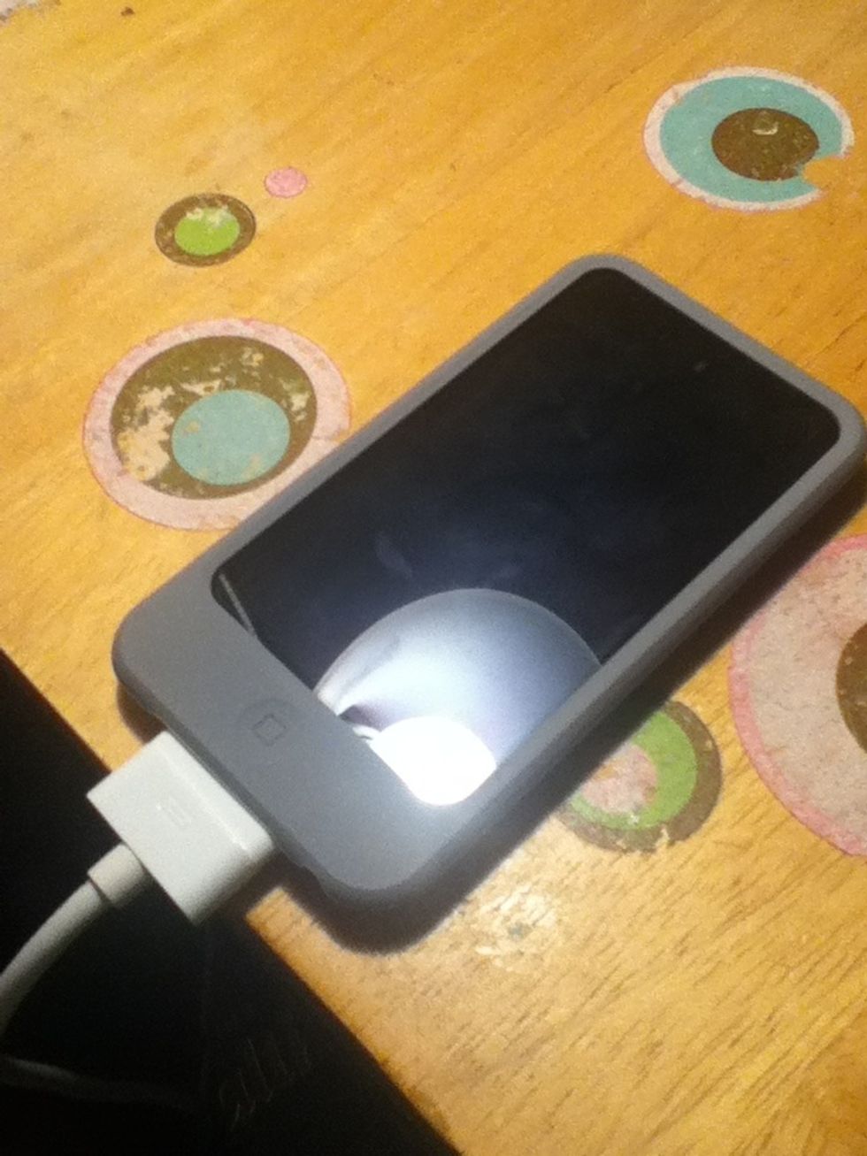 Plug your iOS device into a charger or USB power source.