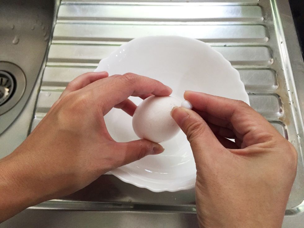 poke a hole in the eggshell to drain out the contents