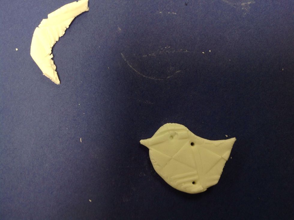 Poke a hole in the top so you can hang it up. Allow it to dry completely. I poked a hole in the bottom to hang feet and then changed my mind.