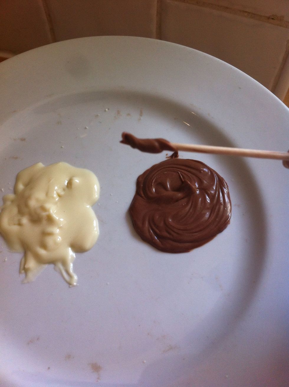 Poke a stick into the chocolate.