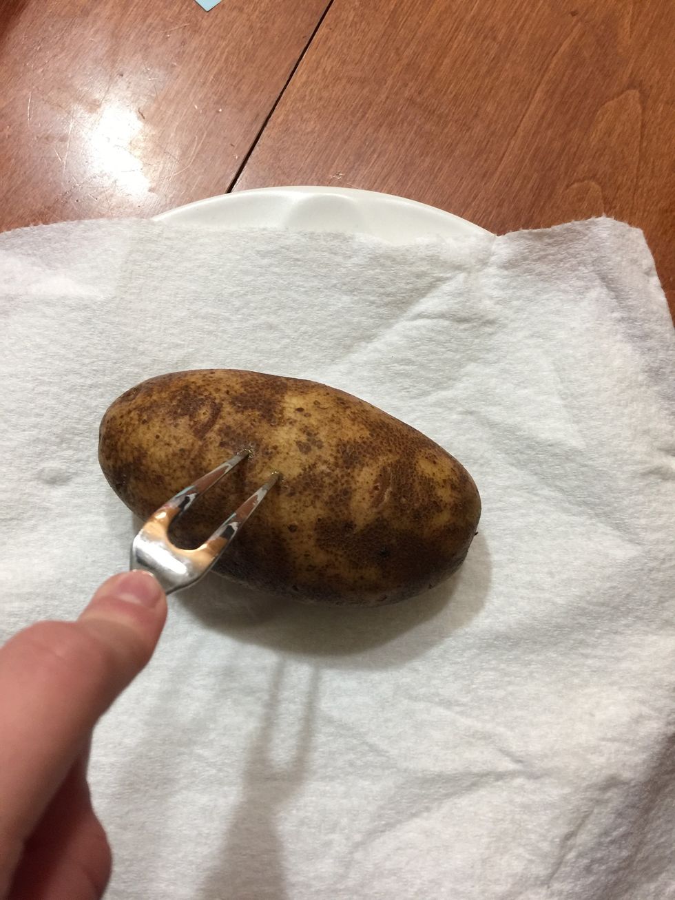 Poke few holes into the potato