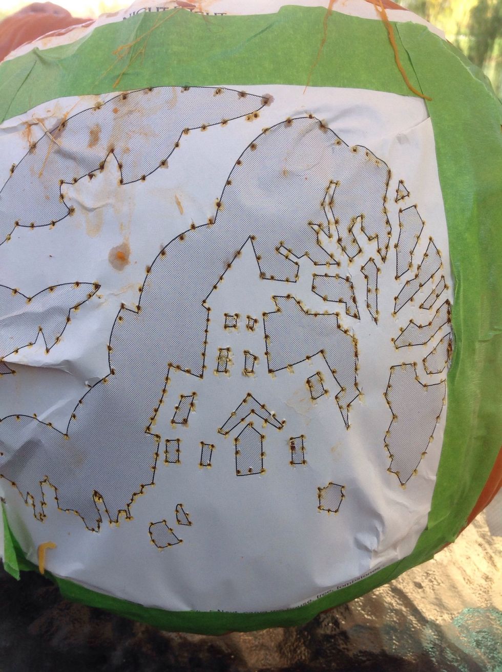 Poke holes in the outline of your pattern. This step takes some time but it's well worth doing a good job.