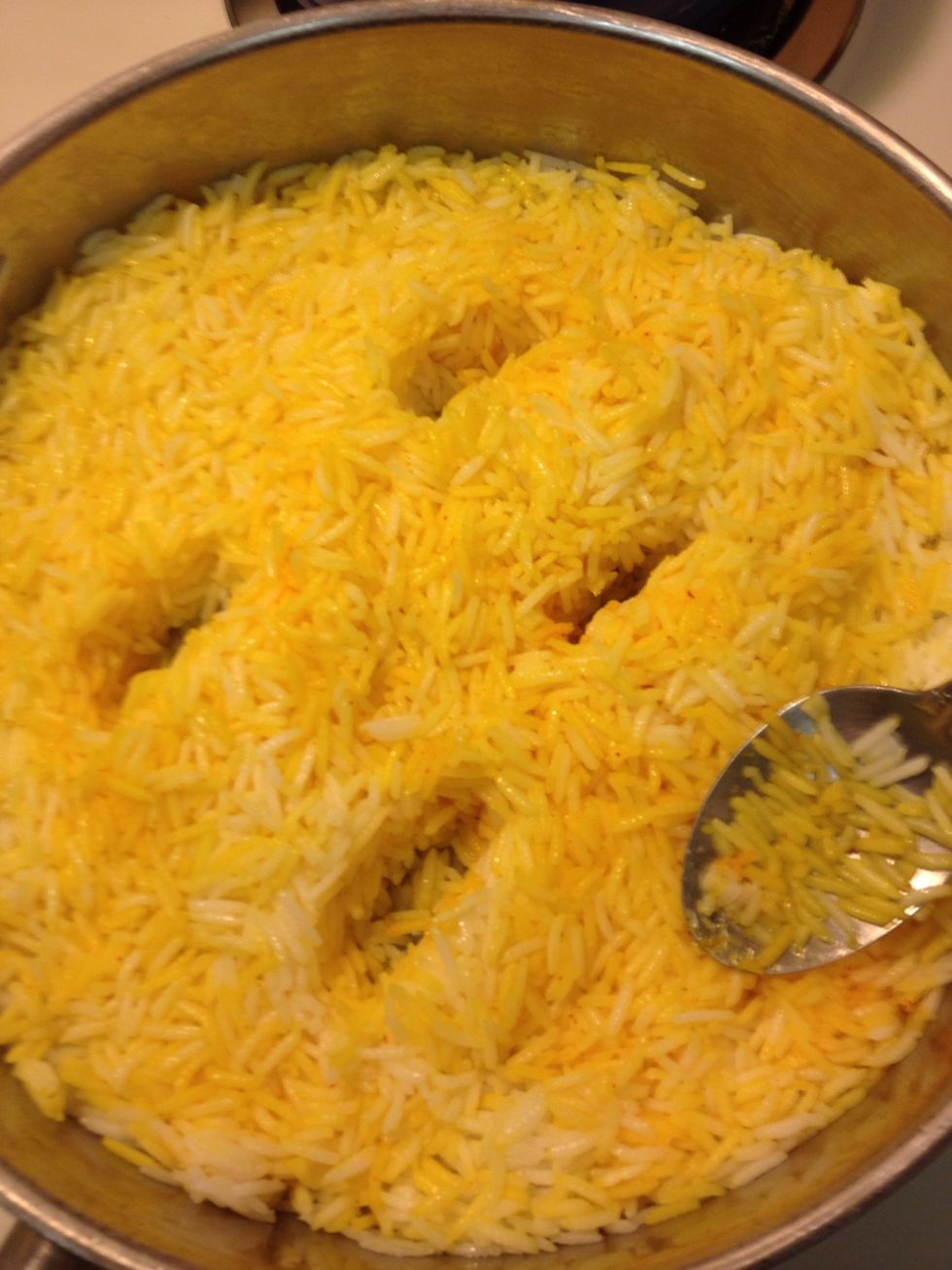 Poke some holes to help see how the tadiq is frying and cook uncovered on medium heat for an additional 5 minutes whilst rotating pan and smelling often for signs of burnt rice.