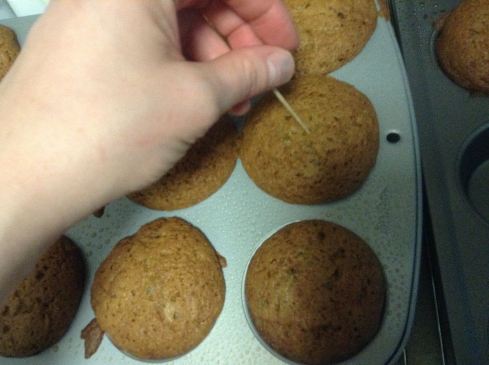 Poke the biggest muffin with a toothpick