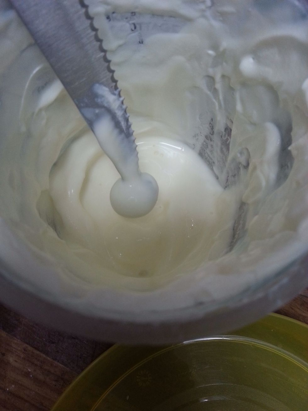 Poke the blueberry with a toothpick (couldn't find one so I had to use a knife) and dip in yogurt.