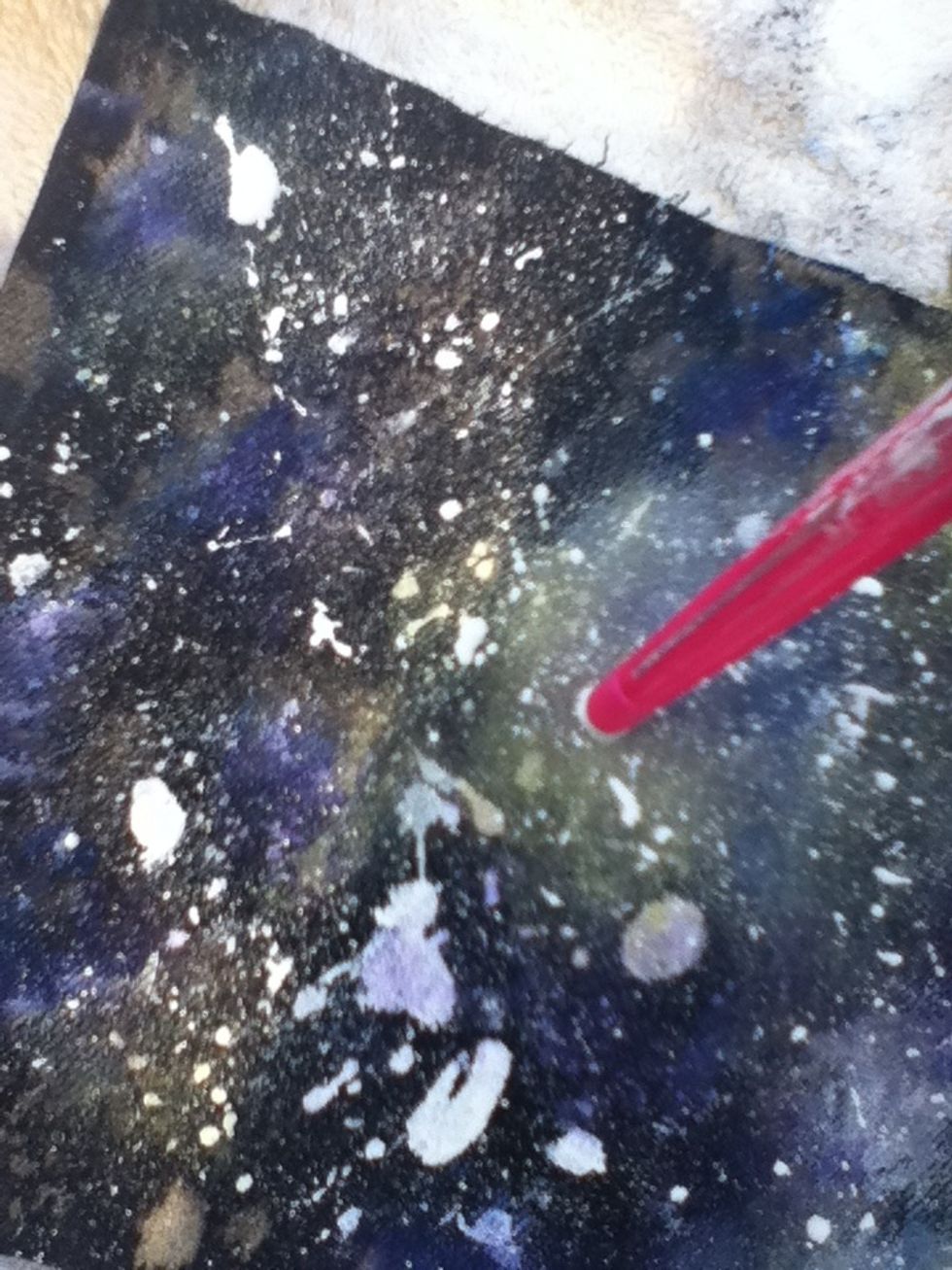 Poke the jeans all around to look like stars.