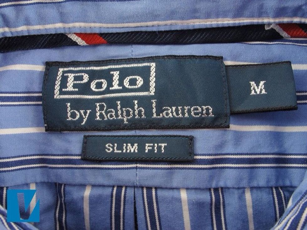 Polo by Ralph Lauren collar labels feature the name logo, and sometimes also include the polo player logo. Check the stitching matches the colour of the shirt, or is a defaultnavy blue.
