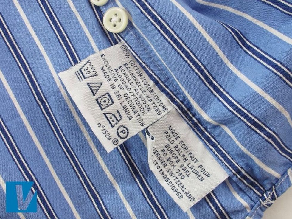 Polo by Ralph Lauren shirts feature a variety of care labels. All labels though will have evenly spaced copy, will feature a registered trademark R, and be stitched neatly to the shirt.