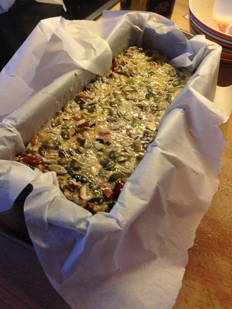Poor into bread form. Mine is rubbish, so I use baking sheet to make the bread come out more easily. If you want, you can decorate your bread by topping it with pumpkin seeds or sesame down the middle