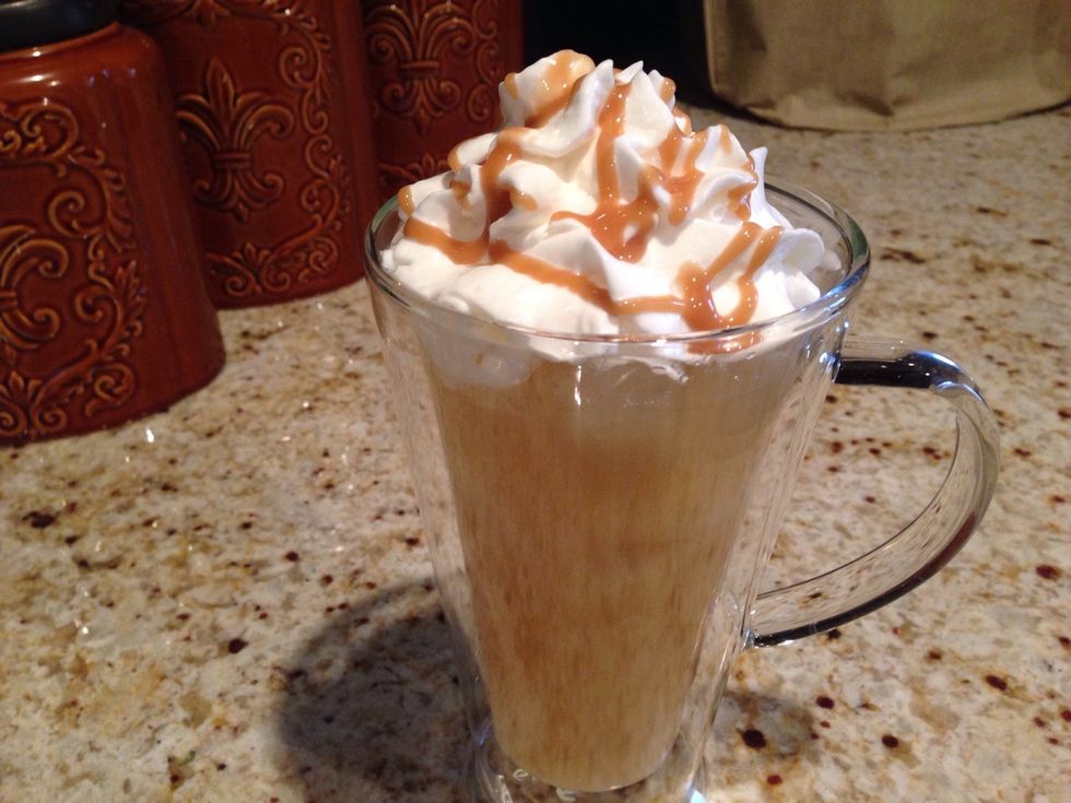 Poor the cider over the ice, add the cream and drizzle the sauce over the whipped cream. Enjoy!