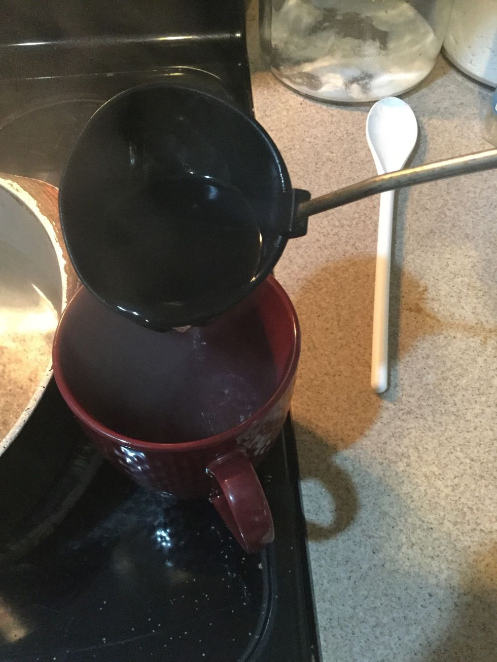 Poor the hot water in a separate mug