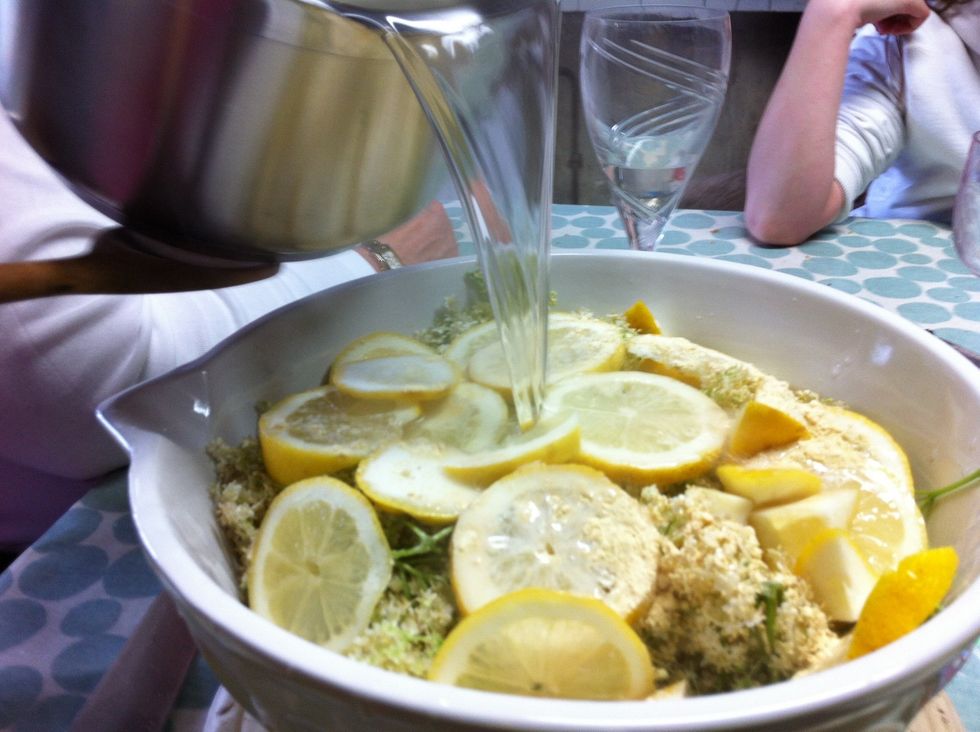 Poor the now cool ish water with the sugar in over the top and with a spoon make sure it is all covered